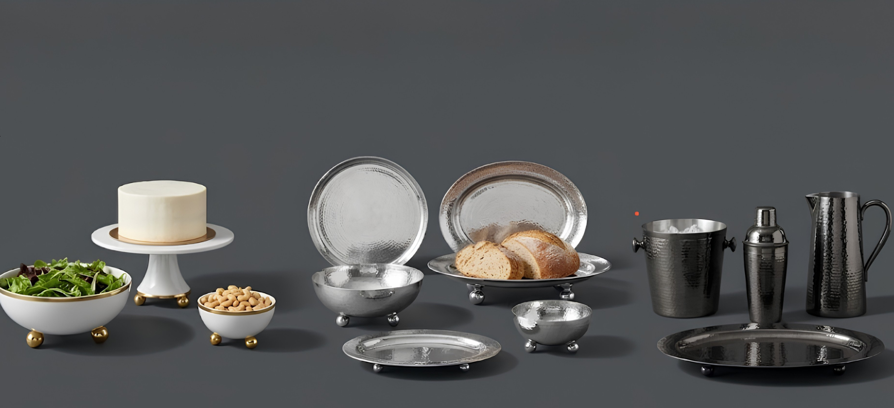 Collection of Wiallen kitchenware items including plates, bowls, and a cake on a dark background.